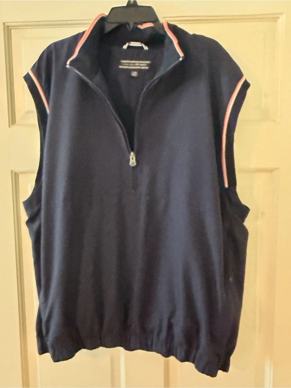 Cutter & Buck ladies Navy Sleeveless Golf Pullover with Coral Trim